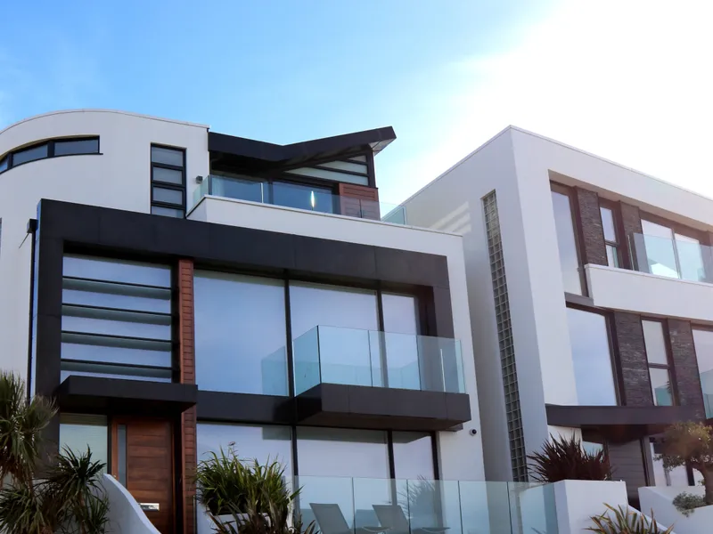 Modern residence with glass balconies and clean architectural lines, Texas real estate
